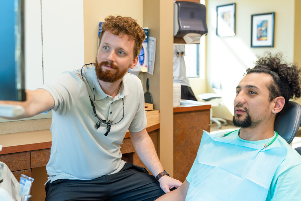 Dr Gresham with Patient